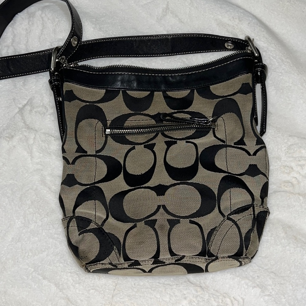 Black and gray adjustable crossbody straps